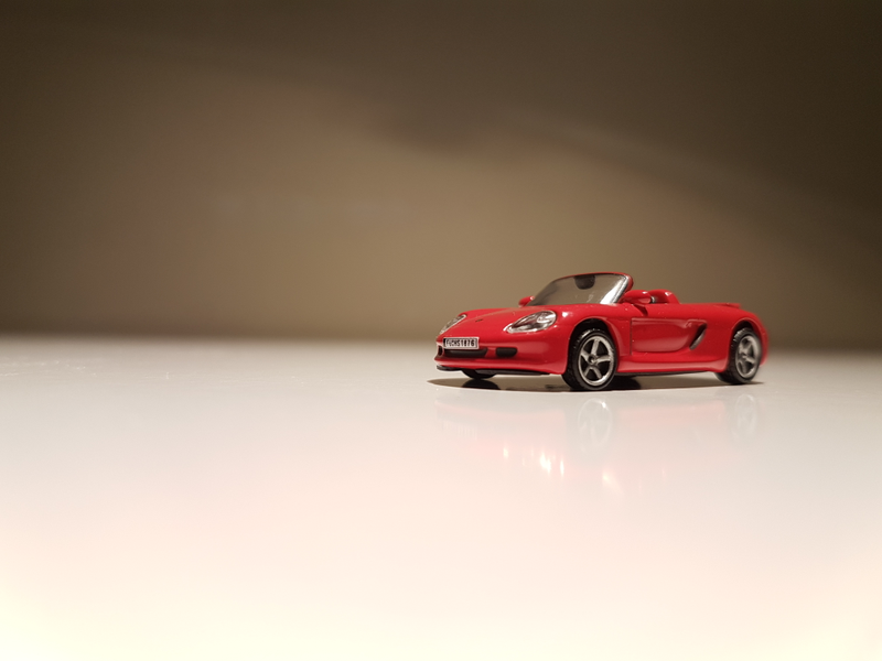 Illustration for article titled Makeitfit Monday: Rennsport Reunion Edition - Malibu International 1:87 Porsche Carrera GT